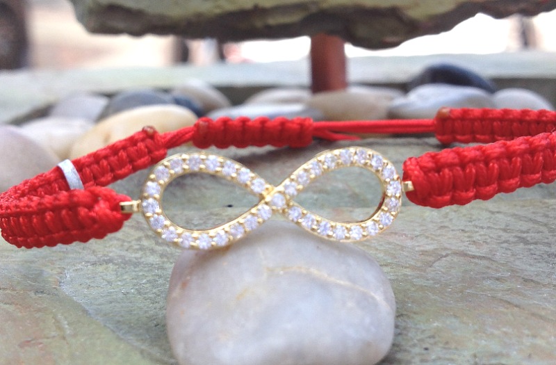 Infinity sign .925 sterling silver with red macrame